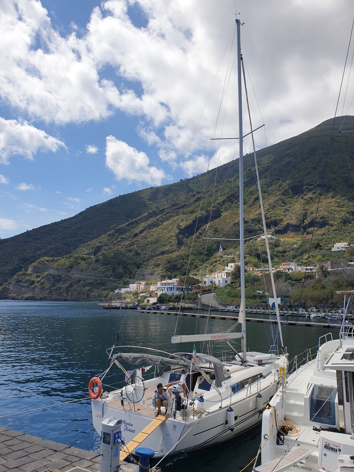 Our chartered boat in an almost vacant harbour